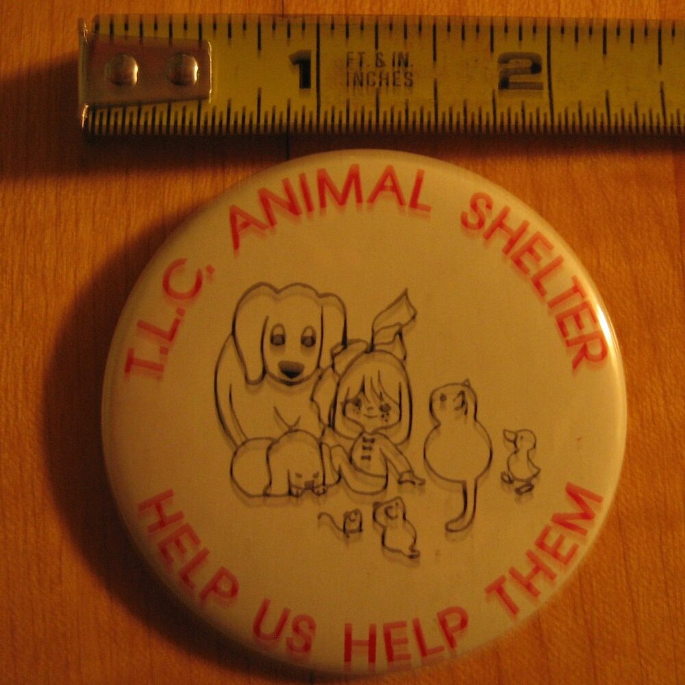 T.L.C.animal Shelter Help Us Help Them Pinback Button.